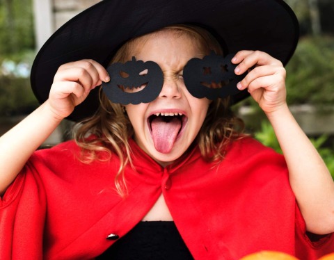 Little girl dressed as a witch at Big Holloween at the Campground at Big Hollow Recreation Area.