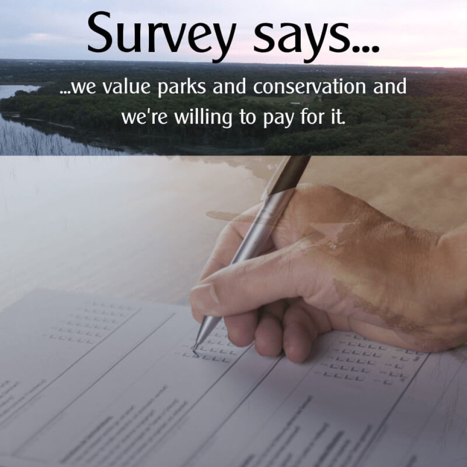 Citizen fills out survey about supporting Des Moines County parks and conservation.